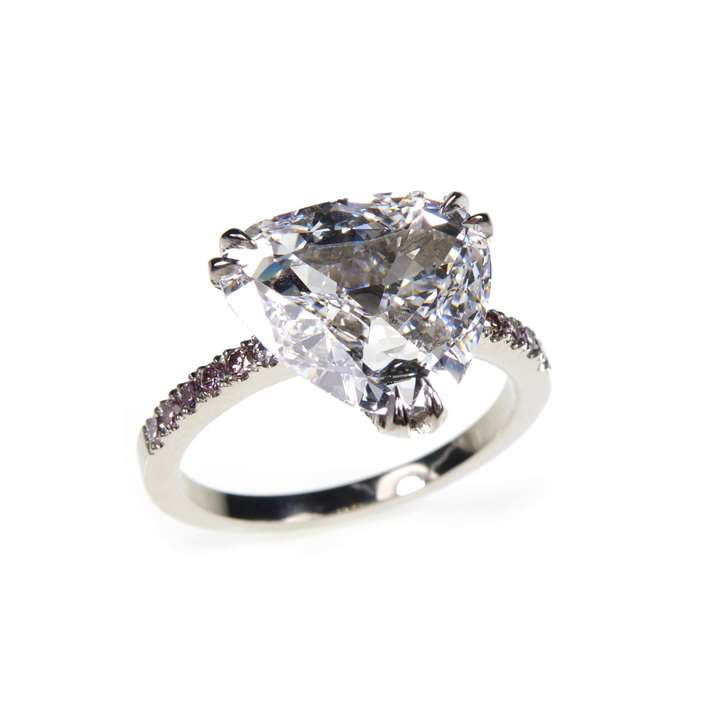 Single stone shield shaped diamond ring